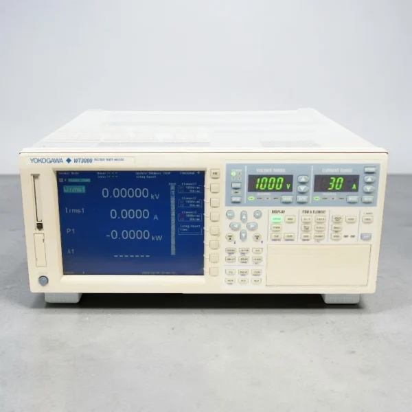 Front view of the Yokogawa WT3000 Precision Power Analyzer powered on and displaying operational data on a light grey background. The central color screen shows live voltage, current, and power measurement readings, while the upper-right digital LED displays show a configured 1000 V voltage range and 30 A current range. The front panel includes softkey menu buttons, a directional navigation pad, function keys, and a power button on the lower left.