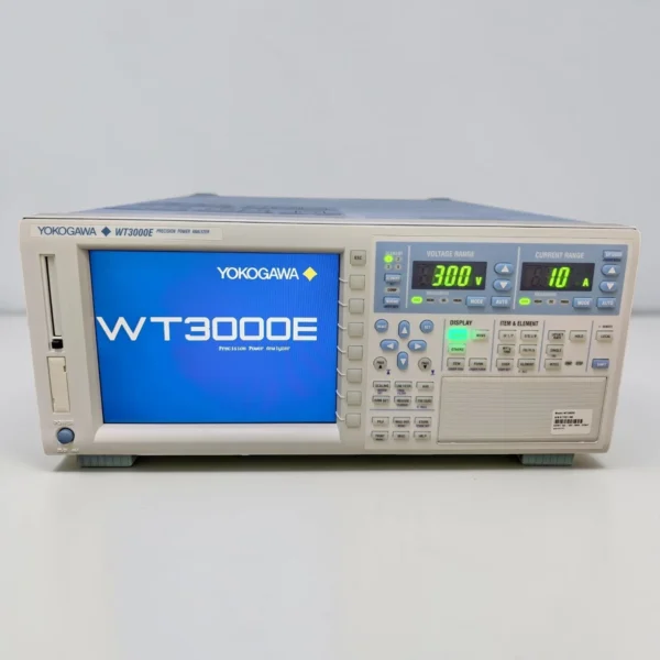Front view of the Yokogawa WT3003E Precision Power Analyzer powered on against a clean white studio background. The active display screen shows the blue Yokogawa WT3000E startup screen. Bright green digital LED readouts on the top right panel indicate a configured 300 V voltage range and 10 A current range. The front panel includes softkey menu buttons, a directional keypad, functional measurement buttons, and a model identification label on the lower right corner.
